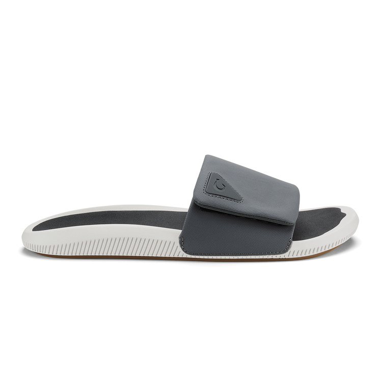 Ulele Slide in Bright White and Tapa, single-band slide sandal on a non-marking outsole