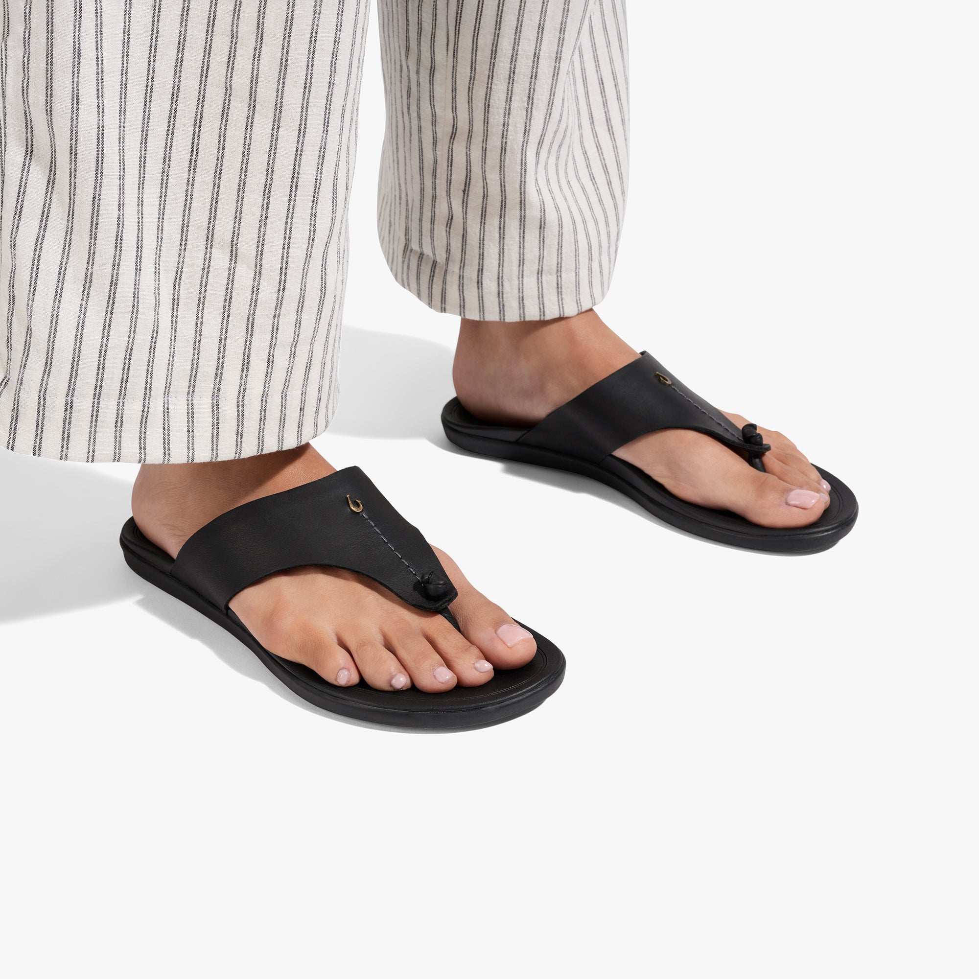 Ho'ōpio Mele - Black / Black – OluKai