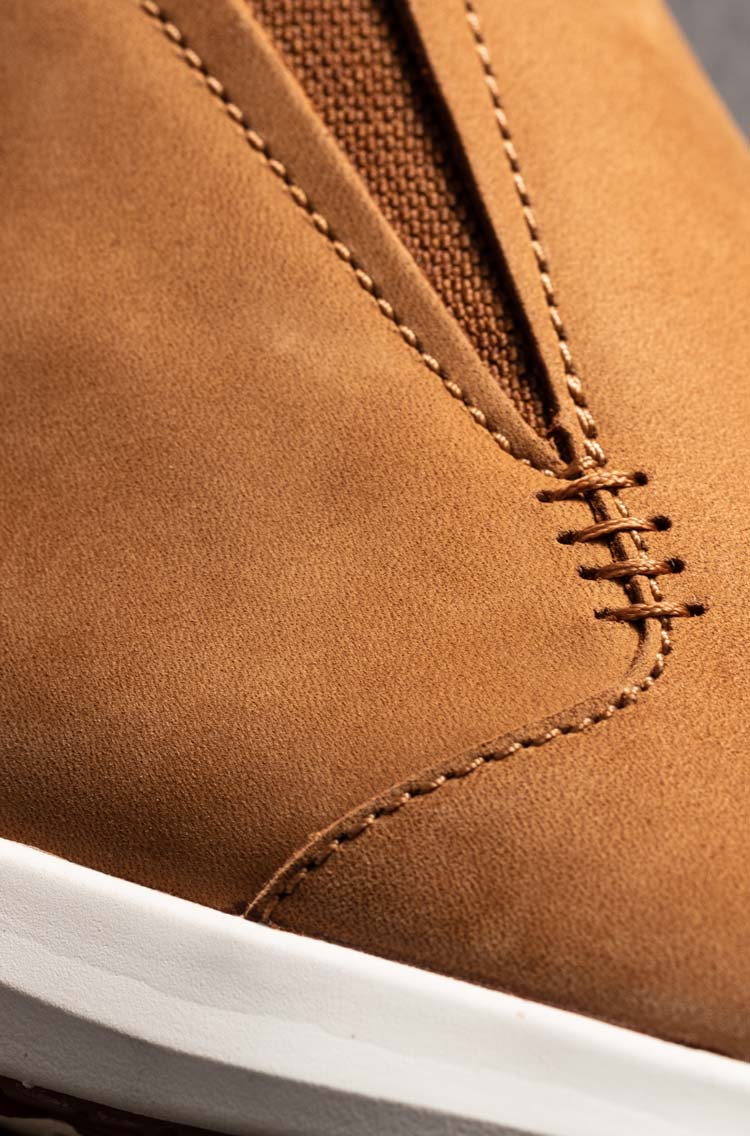 Enjoy the journey in this waterproof nubuck leather boot with craft details inspired by the legendary Hawai‘iloa voyaging canoe. 