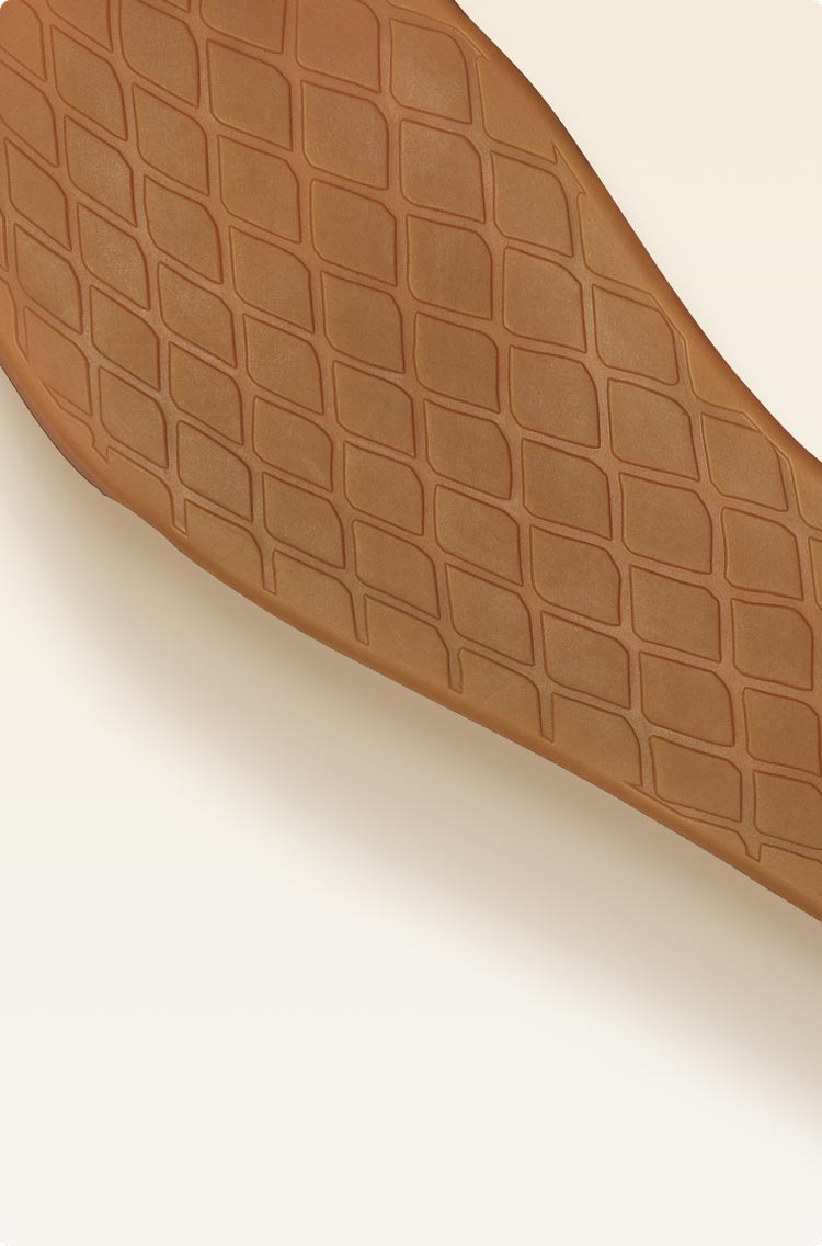 The non-marking rubber outsole with a buffed finish features cross-hatched design for grip with toe and heel bumpers.
