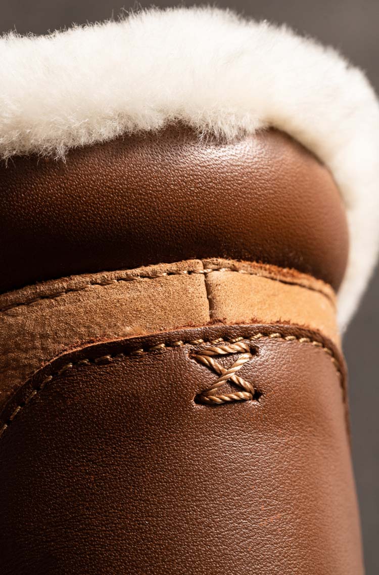 Crafted with fluffy genuine shearling and waterproof nubuck leather, you can take these comfortable boots anywhere.