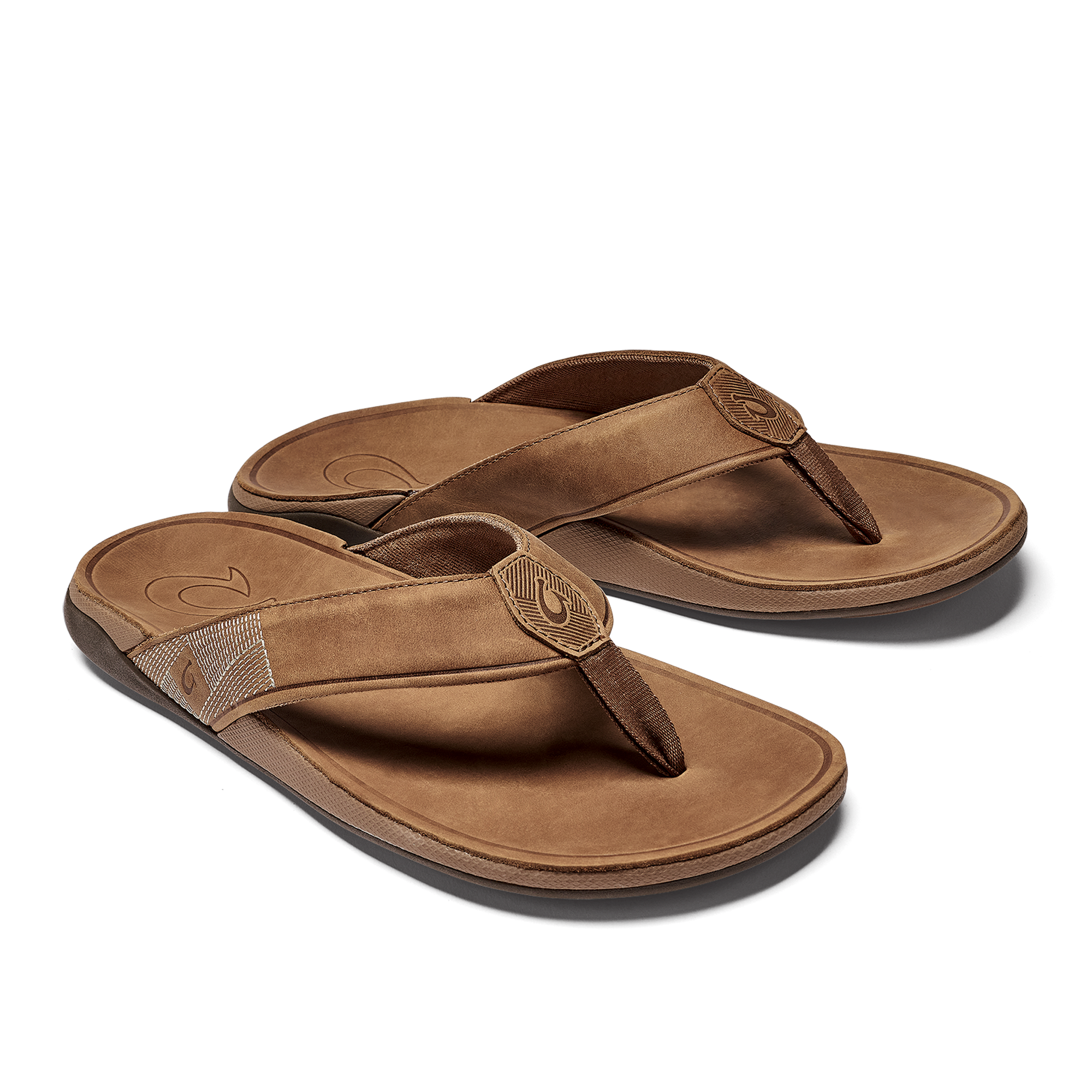 Brown leather thong sandals for women.